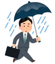 雨が降る 傘をさす会社員
