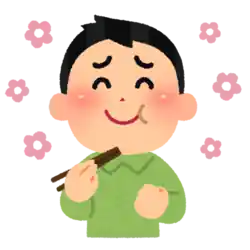 美味しそうにご飯を食べる